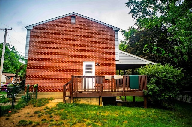 622 National Dr, Penn Hills, PA 15235 - rear view of house with a wooden deck and brick siding