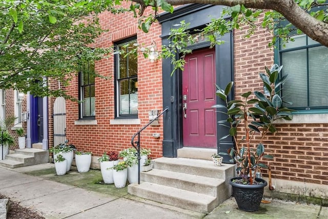 611 Suismon St, East Allegheny, PA 15212 - doorway to property with brick siding