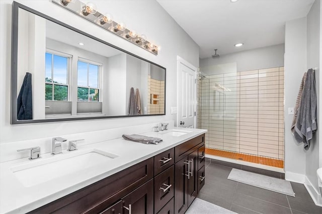 611 Suismon St, East Allegheny, PA 15212 - full bath with double vanity, a tile shower, tile patterned flooring, and recessed lighting