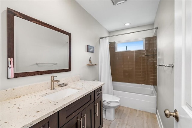 611 Suismon St, East Allegheny, PA 15212 - bathroom featuring vanity, shower / bathtub combination with curtain, and wood finished floors