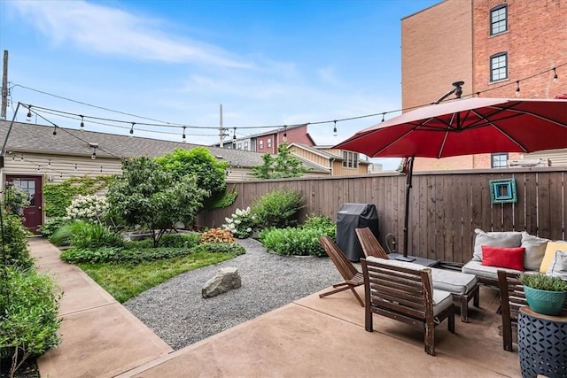 611 Suismon St, East Allegheny, PA 15212 - fenced backyard with a patio, an outdoor hangout area, and grilling area