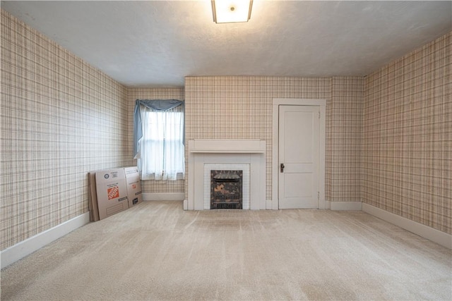 860 W Ingomar Rd, Mccandless, PA 15237 - unfurnished living room with wallpapered walls, a fireplace, and carpet flooring