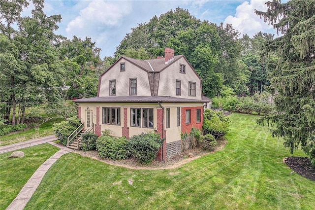 860 W Ingomar Rd, Mccandless, PA 15237 - view of front facade with a front lawn, a chimney, and brick siding
