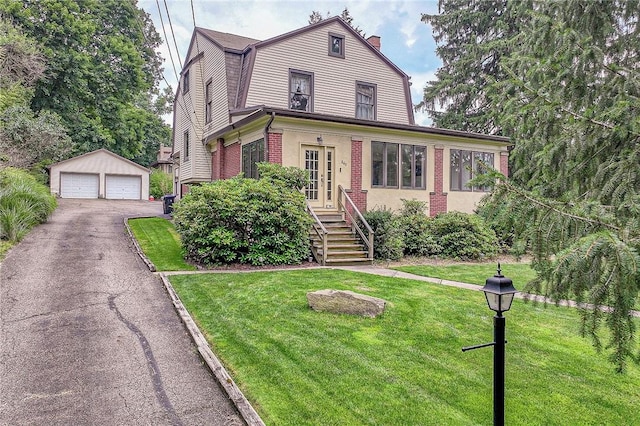 860 W Ingomar Rd, Mccandless, PA 15237 - view of front of home featuring a garage, an outdoor structure, a chimney, and a front lawn
