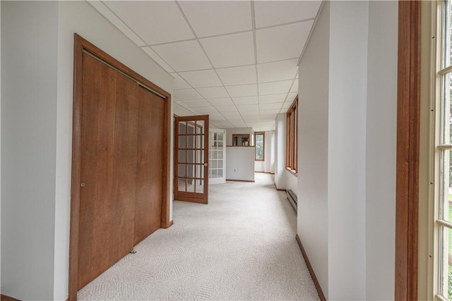 860 W Ingomar Rd, Mccandless, PA 15237 - hallway featuring a paneled ceiling, light colored carpet, baseboard heating, and french doors