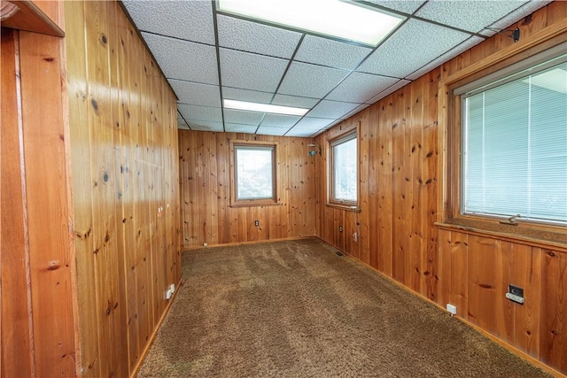 860 W Ingomar Rd, Mccandless, PA 15237 - spare room featuring carpet flooring, a drop ceiling, and wood walls