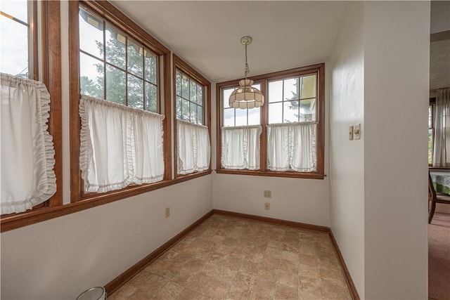 860 W Ingomar Rd, Mccandless, PA 15237 - unfurnished dining area with healthy amount of natural light and stone finish flooring