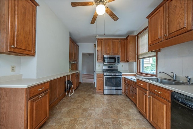 860 W Ingomar Rd, Mccandless, PA 15237 - kitchen with stainless steel appliances, brown cabinets, ceiling fan, light countertops, and stone finish flooring