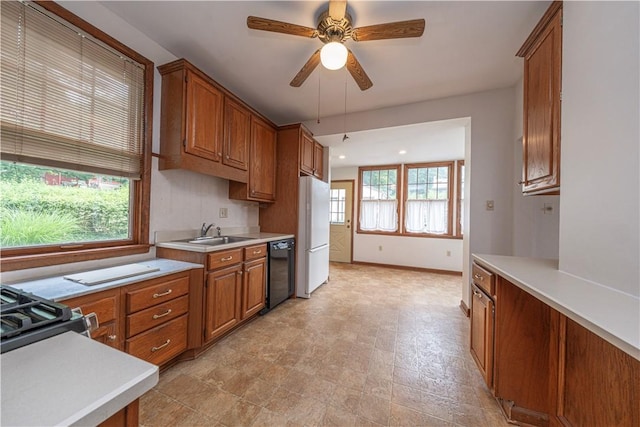 860 W Ingomar Rd, Mccandless, PA 15237 - kitchen with dishwasher, freestanding refrigerator, brown cabinetry, light countertops, and recessed lighting