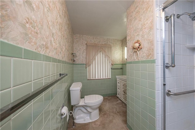 860 W Ingomar Rd, Mccandless, PA 15237 - bathroom with tile walls, wainscoting, a shower with shower door, and wallpapered walls