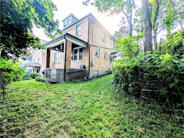 213 N 5th St, Jeannette, PA 15644 - back of property with brick siding