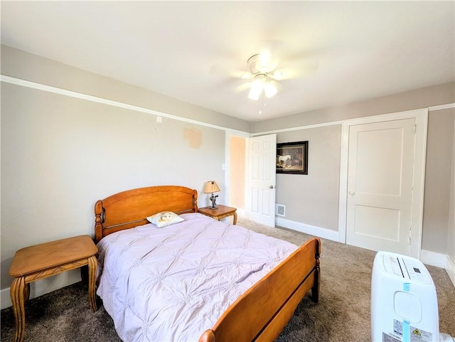 213 N 5th St, Jeannette, PA 15644 - carpeted bedroom featuring baseboards and a ceiling fan