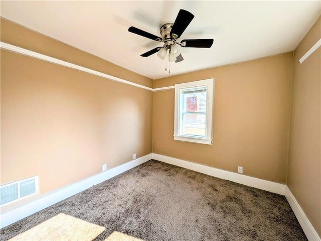 213 N 5th St, Jeannette, PA 15644 - carpeted spare room with baseboards and a ceiling fan