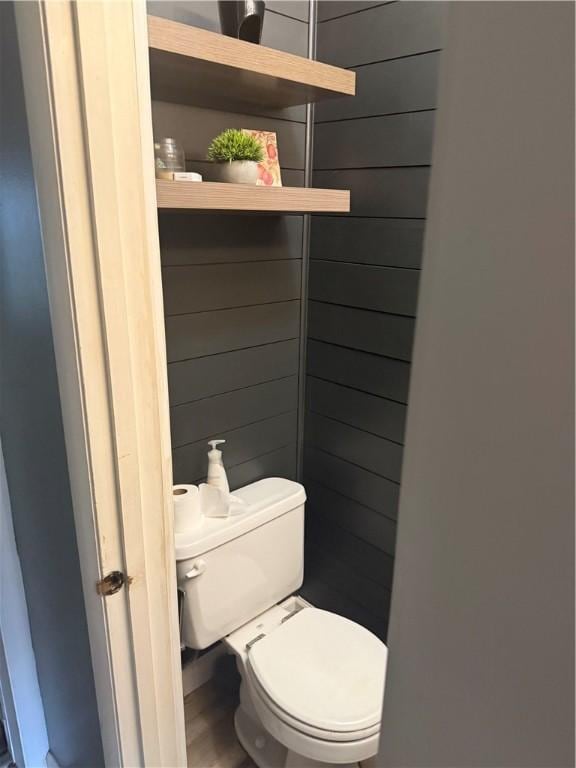 105 White Oak Dr, Twp Of But Se, PA 16001 - bathroom with wood finished floors and wood walls