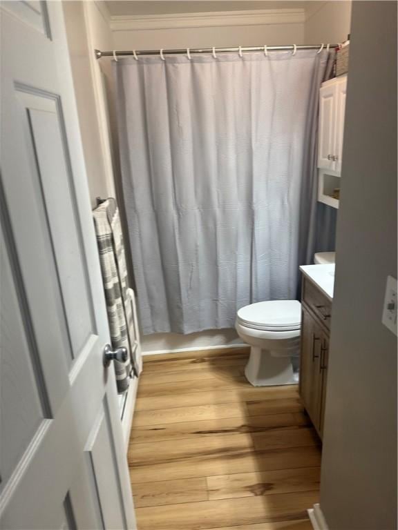 105 White Oak Dr, Twp Of But Se, PA 16001 - full bathroom with vanity, wood finished floors, crown molding, and a shower with shower curtain