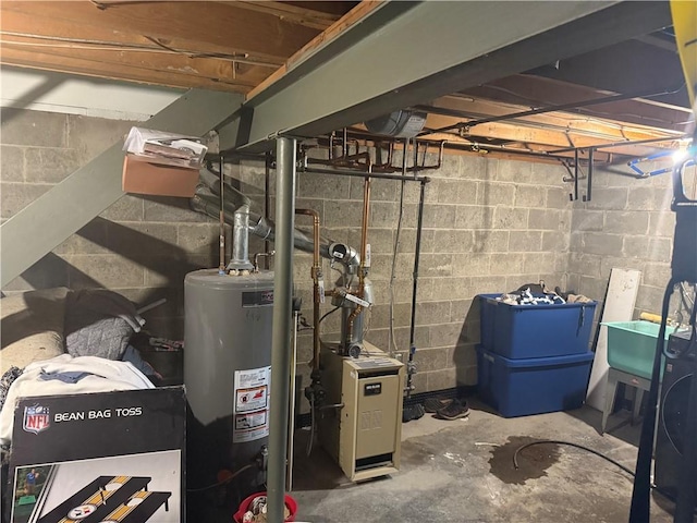 105 White Oak Dr, Twp Of But Se, PA 16001 - unfinished below grade area featuring water heater and a heating unit