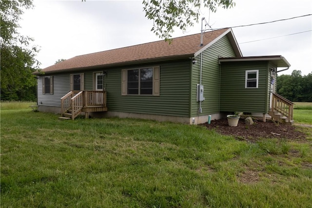 2681 Mallory Rd, Pa, PA 16314 - rear view of property with a lawn and roof with shingles