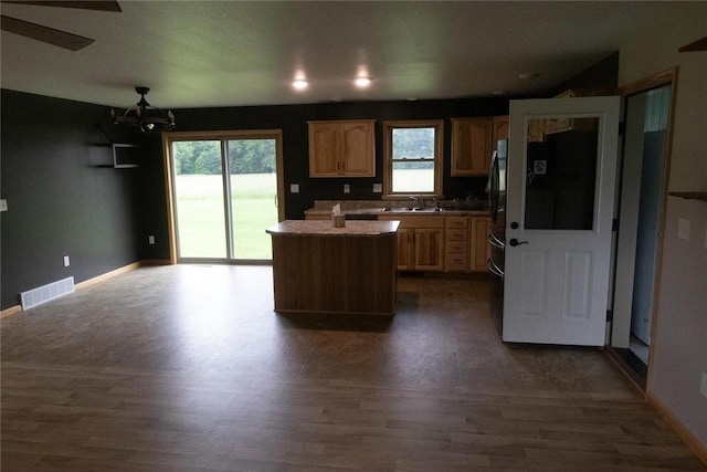 2681 Mallory Rd, Pa, PA 16314 - kitchen with a center island, healthy amount of natural light, and dark wood-style floors