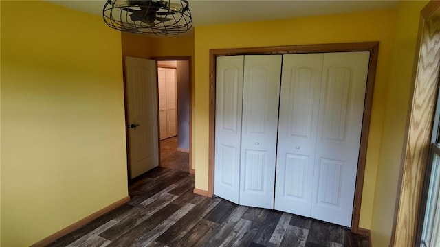 2681 Mallory Rd, Pa, PA 16314 - unfurnished bedroom featuring dark wood-style floors, a closet, and a chandelier