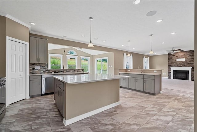 1103 Deerfield Dr, Franklin Park, PA 15143 - kitchen featuring an island with sink, stainless steel dishwasher, gray cabinetry, light marble finish floors, and ornamental molding