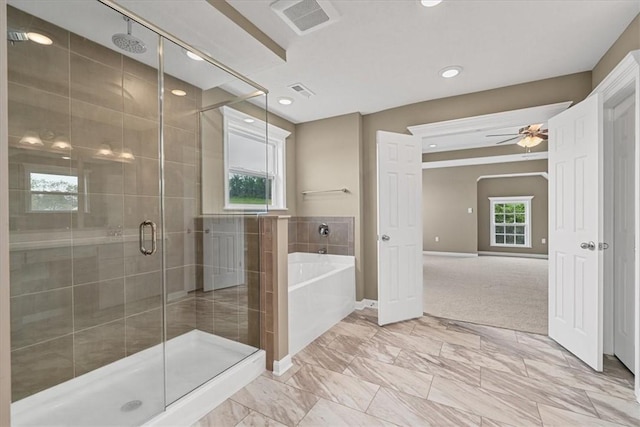 1103 Deerfield Dr, Franklin Park, PA 15143 - bathroom with a stall shower, a bath, a ceiling fan, recessed lighting, and marble look tiles