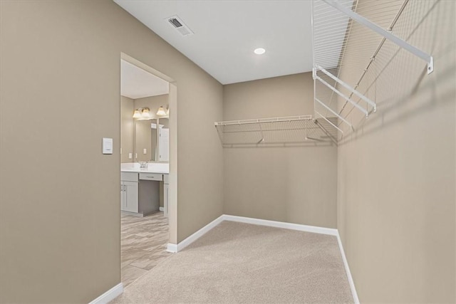 1103 Deerfield Dr, Franklin Park, PA 15143 - walk in closet featuring light carpet