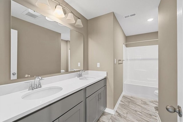 1103 Deerfield Dr, Franklin Park, PA 15143 - bathroom featuring marble finish flooring, double vanity, and shower / bath combination