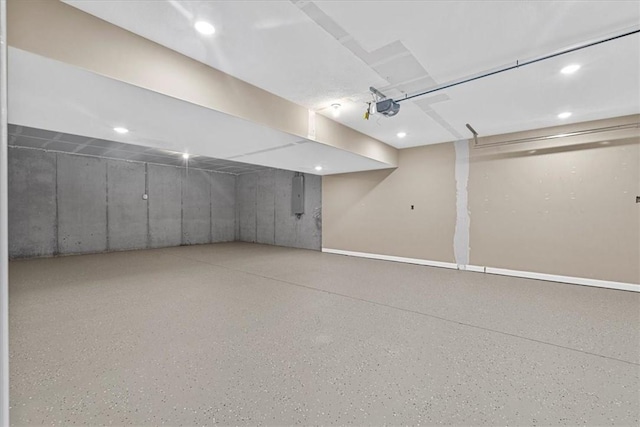 1103 Deerfield Dr, Franklin Park, PA 15143 - garage featuring electric panel, recessed lighting, and a garage door opener