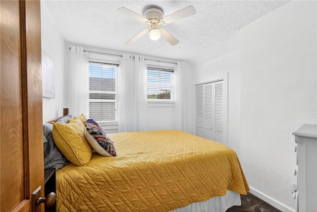 915 Summit St, Mckeesport, PA 15132 - bedroom with a textured ceiling, carpet floors, a closet, ceiling fan, and a textured wall