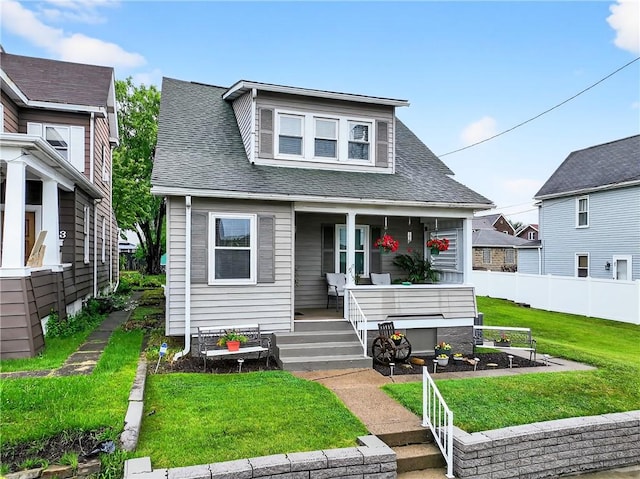 915 Summit St, Mckeesport, PA 15132 - bungalow-style home with covered porch and roof with shingles