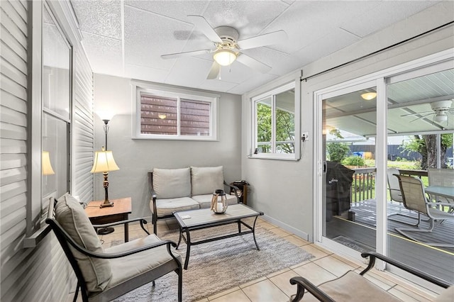 915 Summit St, Mckeesport, PA 15132 - sunroom with a ceiling fan and an outdoor hangout area