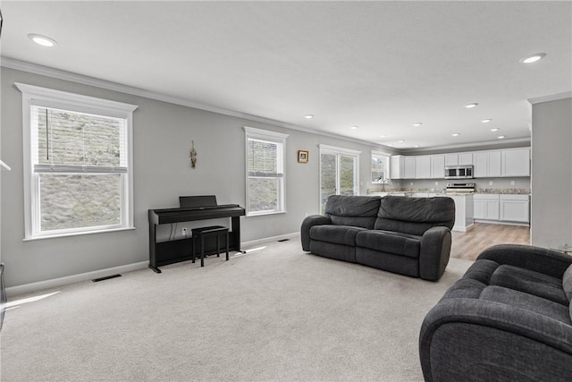 260 Lily Ridge Dr, North Strabane, PA 15317 - living area featuring ornamental molding, light carpet, and recessed lighting