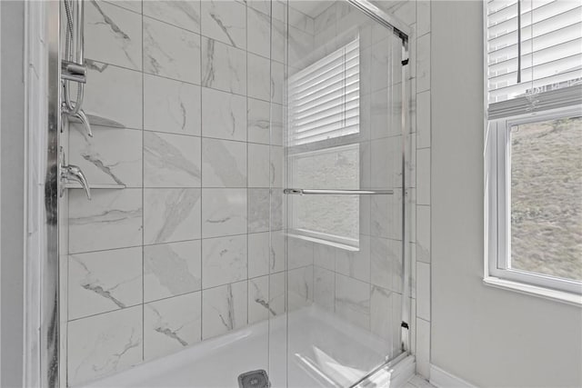 260 Lily Ridge Dr, North Strabane, PA 15317 - full bathroom with plenty of natural light and bath / shower combo with glass door