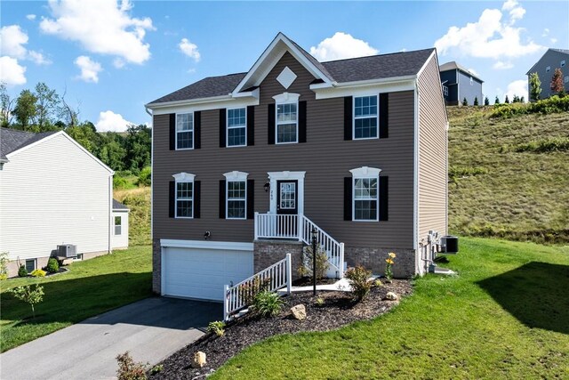 260 Lily Ridge Dr, North Strabane, PA 15317 - view of front of home with a front yard, asphalt driveway, and an attached garage