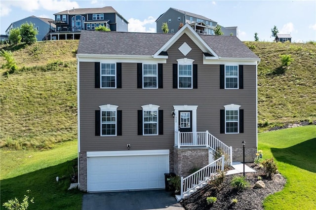 260 Lily Ridge Dr, North Strabane, PA 15317 - view of front of property featuring an attached garage, a front lawn, and driveway