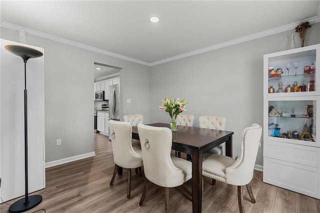 260 Lily Ridge Dr, North Strabane, PA 15317 - dining space with crown molding, wood finished floors, and recessed lighting