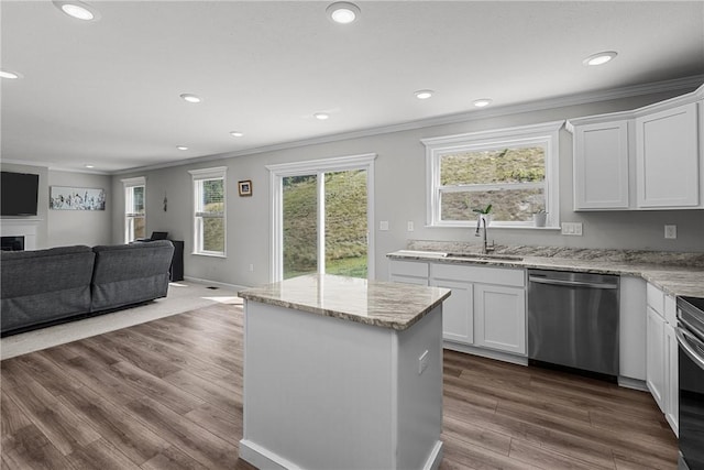 260 Lily Ridge Dr, North Strabane, PA 15317 - kitchen featuring stainless steel dishwasher, crown molding, white cabinets, open floor plan, and light stone counters