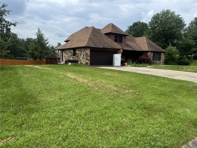 4401 Ridgewood Dr, Jefferson Hills, PA 15332 - view of front of house featuring concrete driveway, stone siding, and a garage