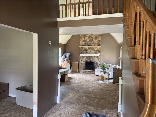 4401 Ridgewood Dr, Jefferson Hills, PA 15332 - living area featuring lofted ceiling and a stone fireplace