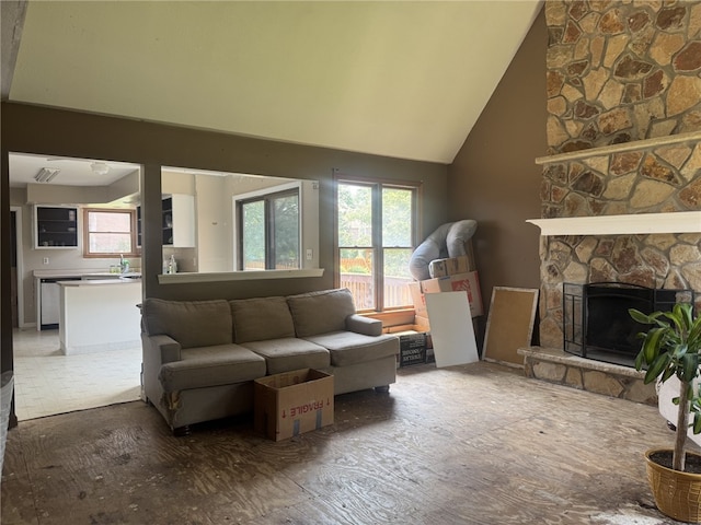 4401 Ridgewood Dr, Jefferson Hills, PA 15332 - living area featuring a stone fireplace and high vaulted ceiling
