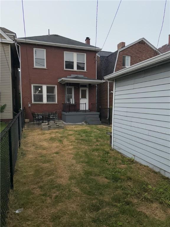 832 Maplewood Ave, Ambridge, PA 15003 - rear view of house featuring brick siding