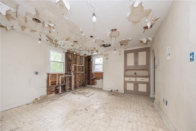 138 Highland Ave, West View, PA 15229 - unfurnished living room featuring arched walkways
