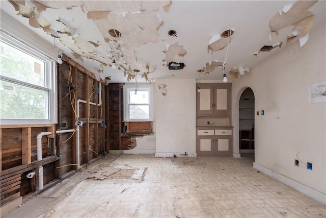 138 Highland Ave, West View, PA 15229 - unfurnished living room featuring arched walkways