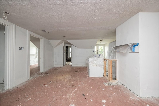 138 Highland Ave, West View, PA 15229 - unfurnished living room with a textured ceiling