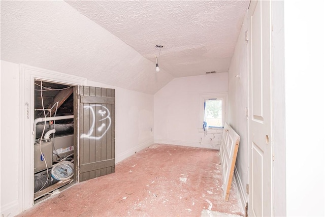 138 Highland Ave, West View, PA 15229 - additional living space featuring lofted ceiling and a textured ceiling