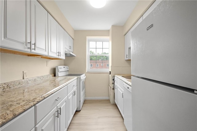 5900 Babcock Blvd Unit 31, Ross Twp, PA 15237 - kitchen with white appliances, under cabinet range hood, white cabinetry, and light wood-style floors