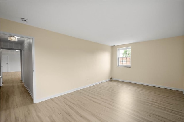 5900 Babcock Blvd Unit 31, Ross Twp, PA 15237 - empty room with light wood-type flooring and a smoke detector