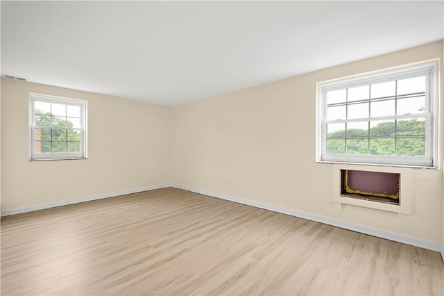 5900 Babcock Blvd Unit 31, Ross Twp, PA 15237 - spare room featuring light wood-style floors and a fireplace