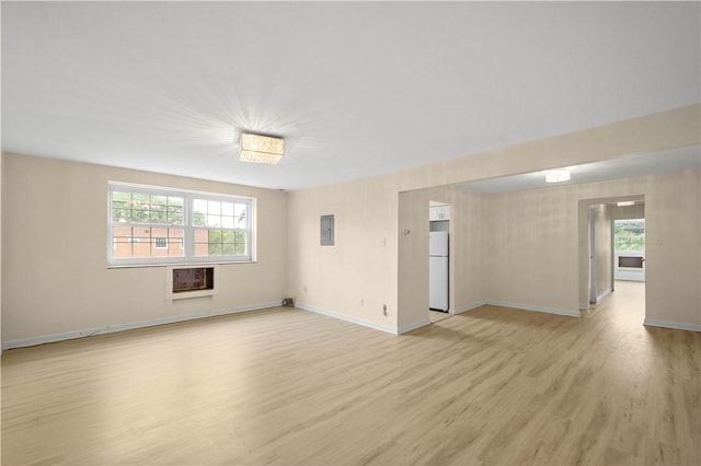 5900 Babcock Blvd Unit 31, Ross Twp, PA 15237 - spare room with light wood finished floors, electric panel, and a wall mounted AC