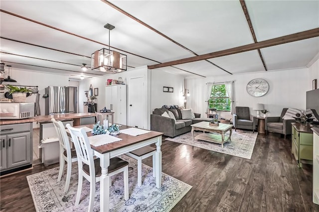 8995 Puritan Ln, Conneaut Twp, PA 16424 - dining area with dark wood finished floors and a chandelier
